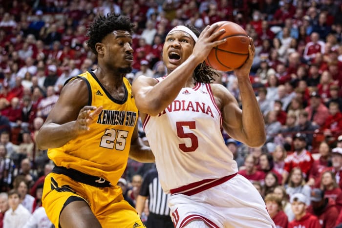 Indiana Hoosiers forward Malik Reneau (5) shoots the ball while Kennesaw State Owls forward Rongie Gordon (25) defends in the first half at Simon Skjodt Assembly Hall.
